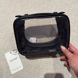 Calpak Small Clear Cosmetic Case in Black
